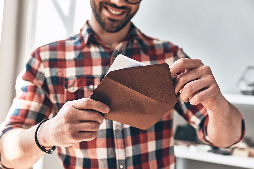 Man reading an anniversary card